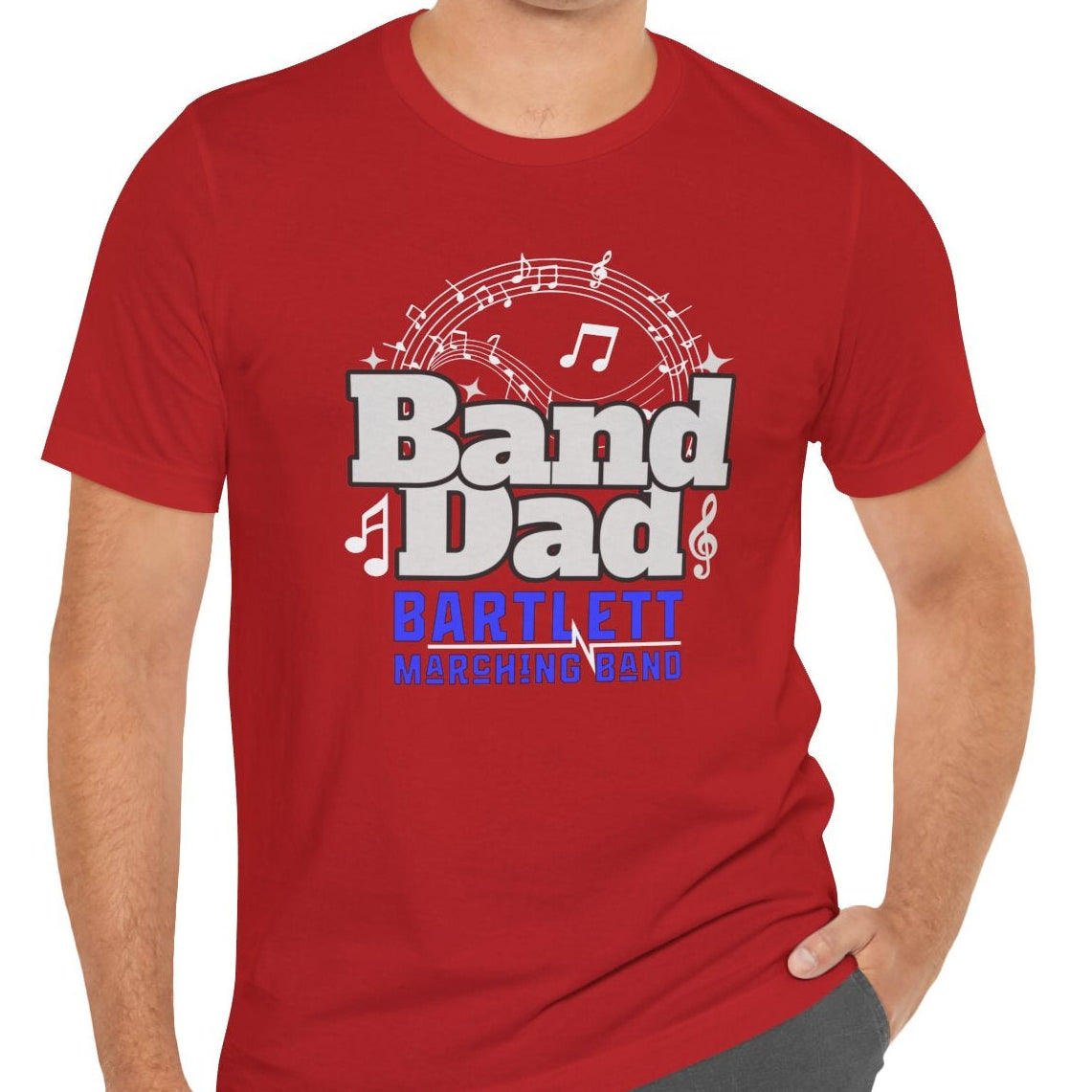 Man wearing a red 'Band Dad' t-shirt with musical notes on a white background