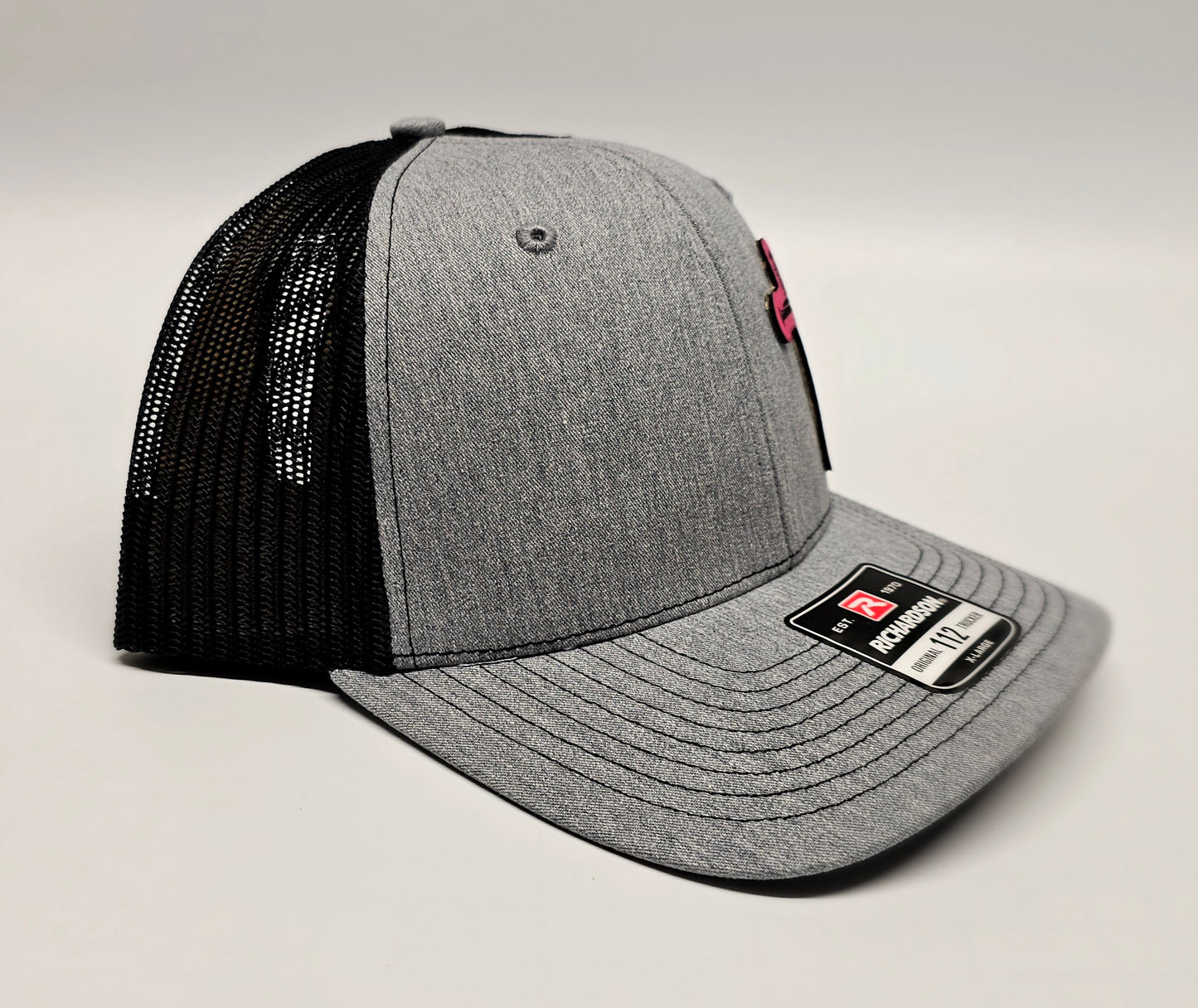 Laser Engraved Leatherette Patch Trucker Hat.