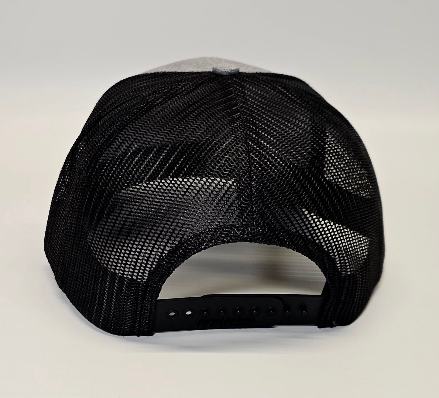 Laser Engraved Leatherette Patch Trucker Hat.