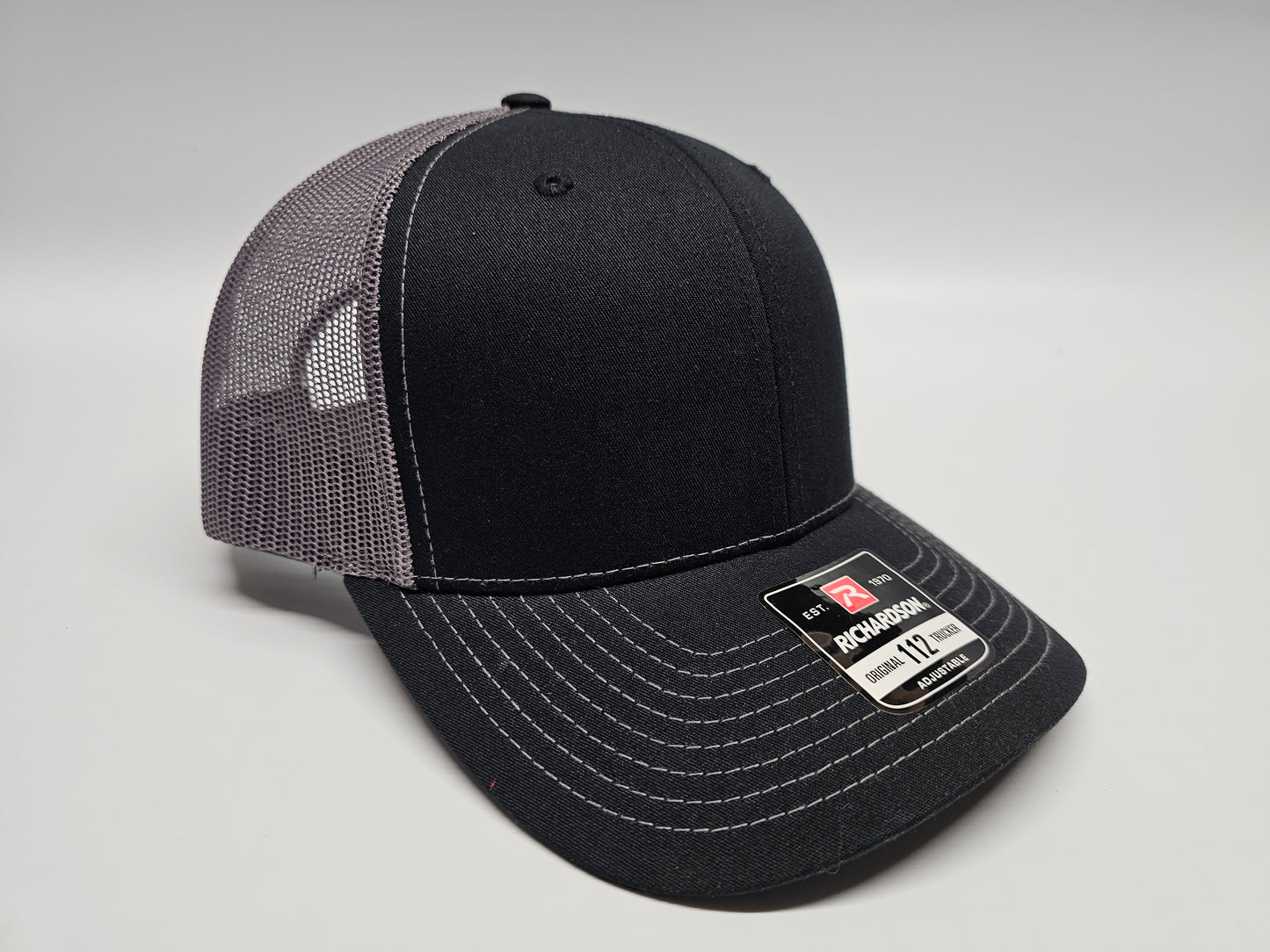 Laser Engraved Leatherette Patch Trucker Hat.